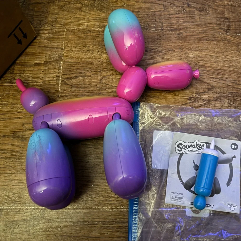 Squeakies interactive balloon animal rainbow dog